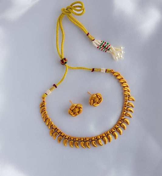 Tarini Golden Leaf necklace with earrings
