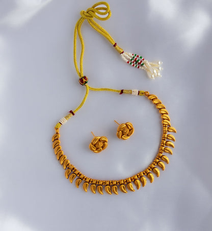 Tarini Golden Leaf necklace with earrings