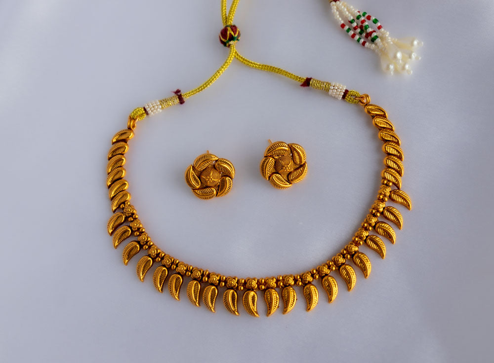Tarini Golden Leaf necklace with earrings