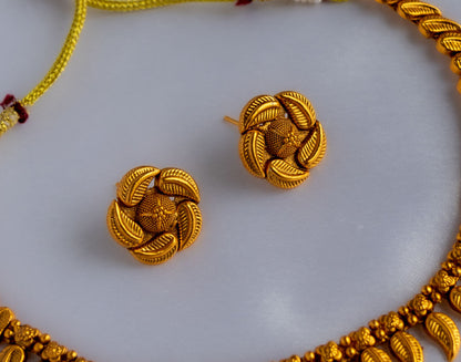 Tarini Golden Leaf necklace with earrings