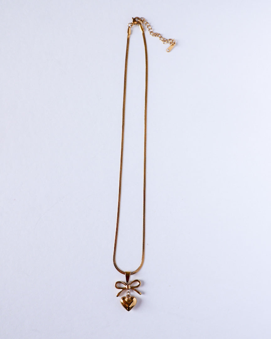 Tarini Bow with heart necklace