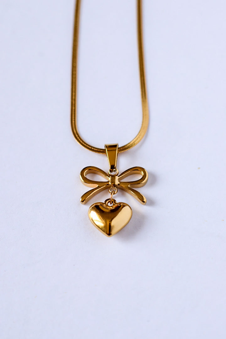 Tarini Bow with heart necklace
