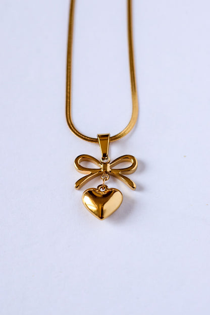Tarini Bow with heart necklace