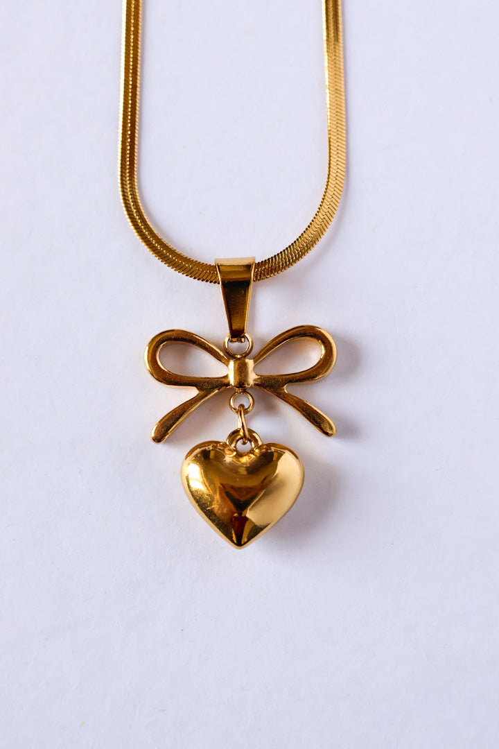 Tarini Bow with heart necklace